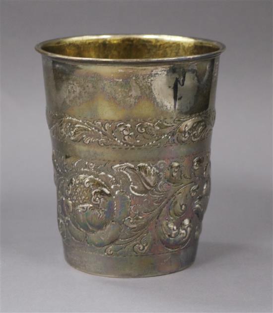An early 20th century Danish embossed white metal beaker, stamped A. Steffensen, date for 1918, 7 oz.